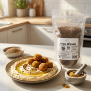 KMIN-RZYMSKI-ZIARNA-Kremowy-hummus-z-falafelami-i-moździerzem-z-kminem.png