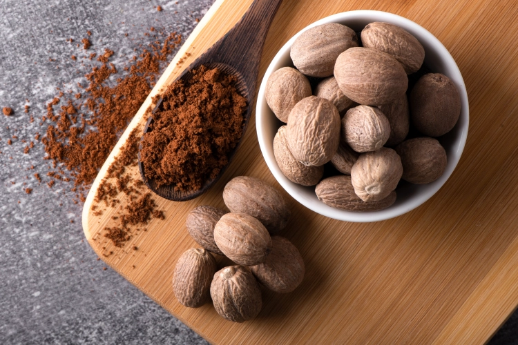 nutmeg-macro-bowl-nutmeg-powder-wooden-spoon-nutmeg-spice.jpg