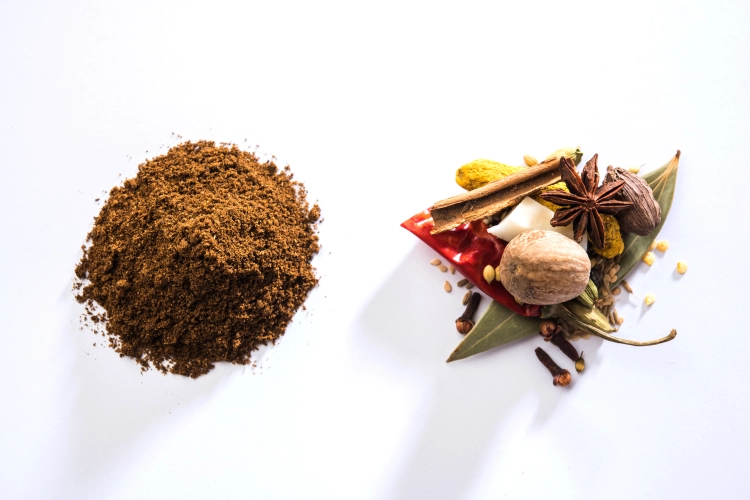 indian-garam-masala-powder-bowl-it-s-ingredients-colourful-spices-served-moody-background-selective-focus.jpg